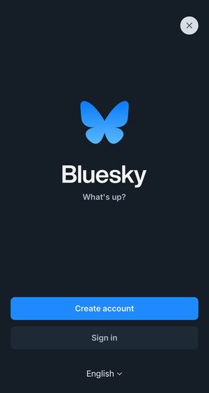 A screenshot of Bluesky iOS app startup screen with Create account & Sign in buttons