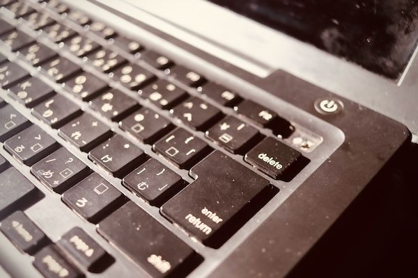 Photo of the keyboard of black MacBook